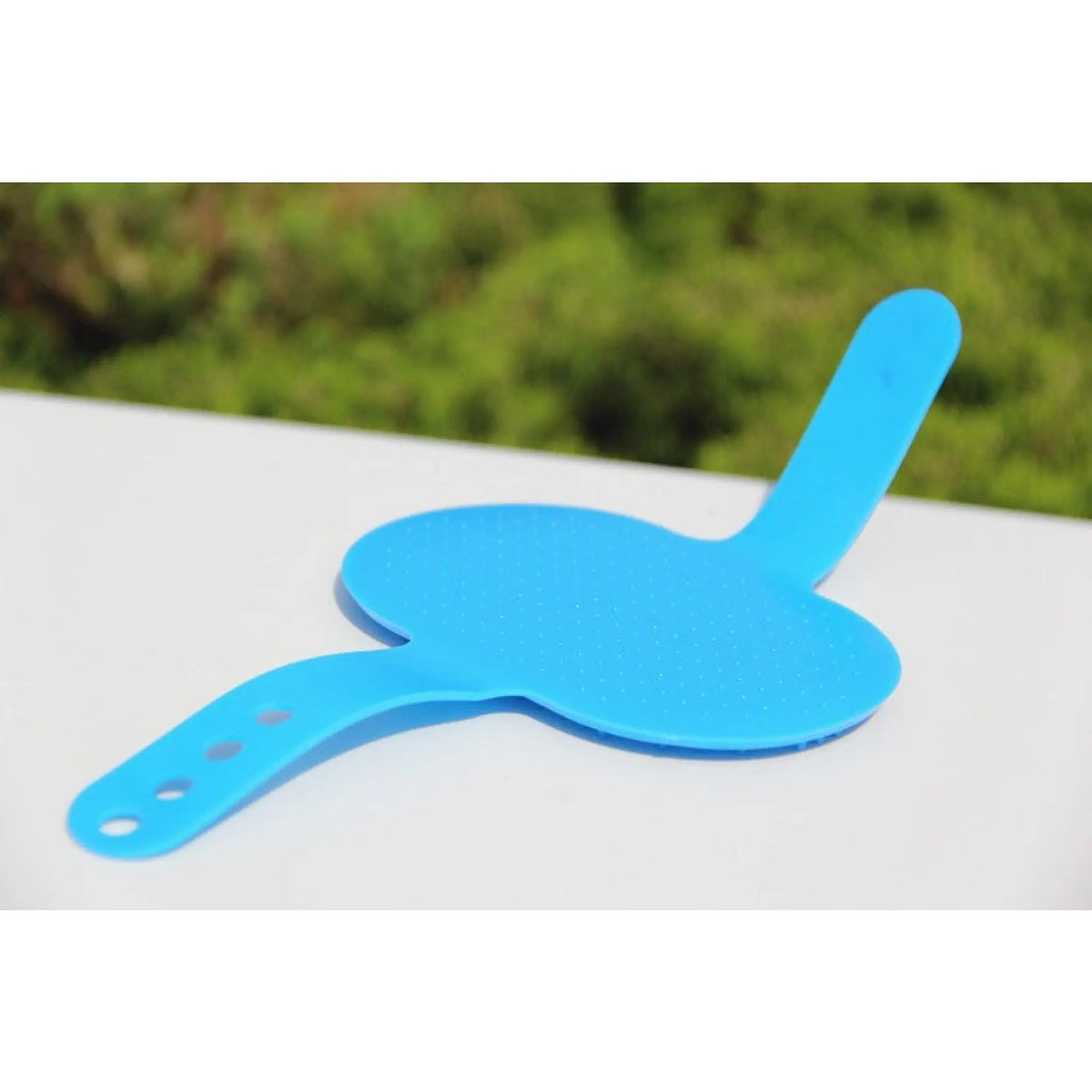 Blue rubber pet bath brush with hand strap and textured back