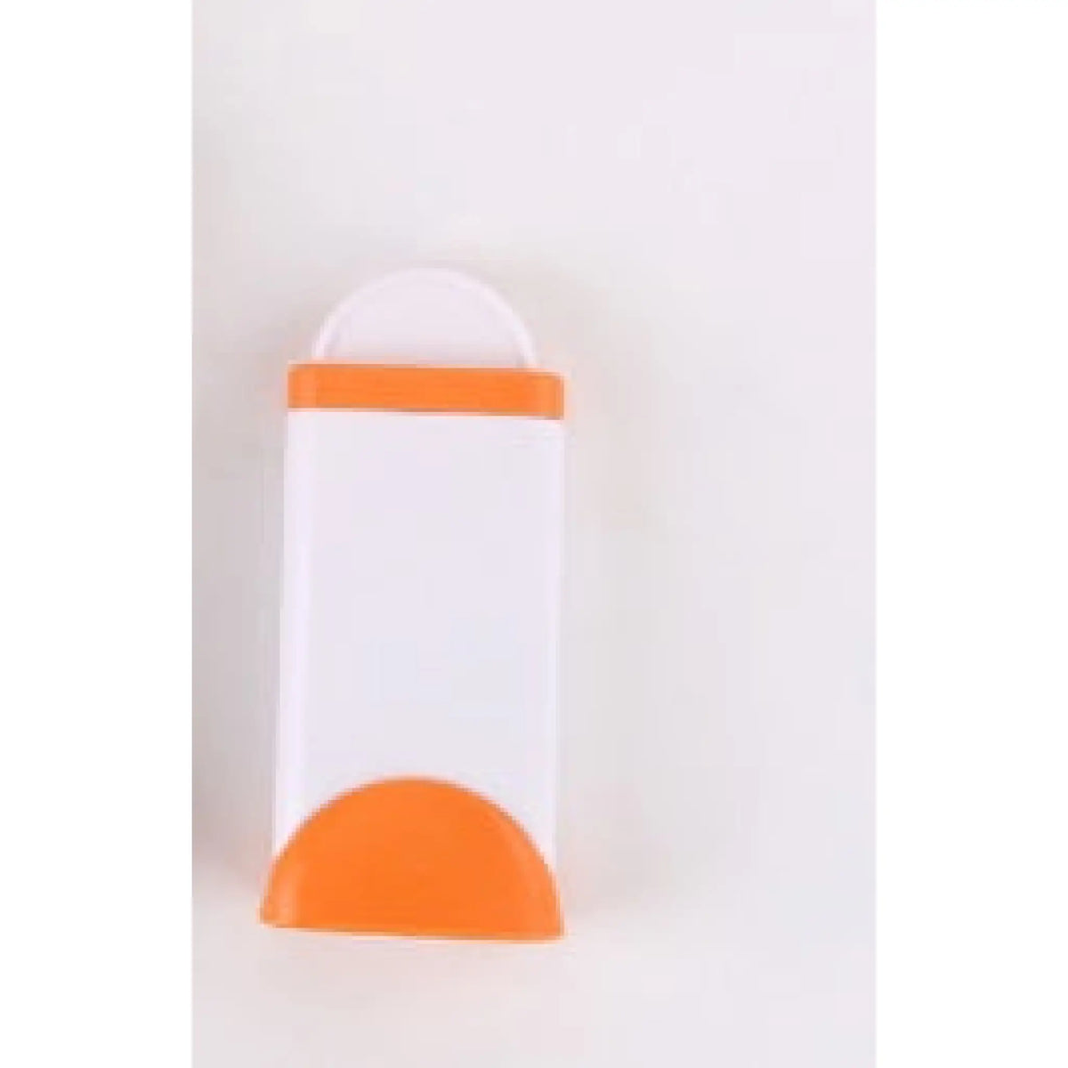 Orange and white self-cleaning base for pet hair remover brush, front view