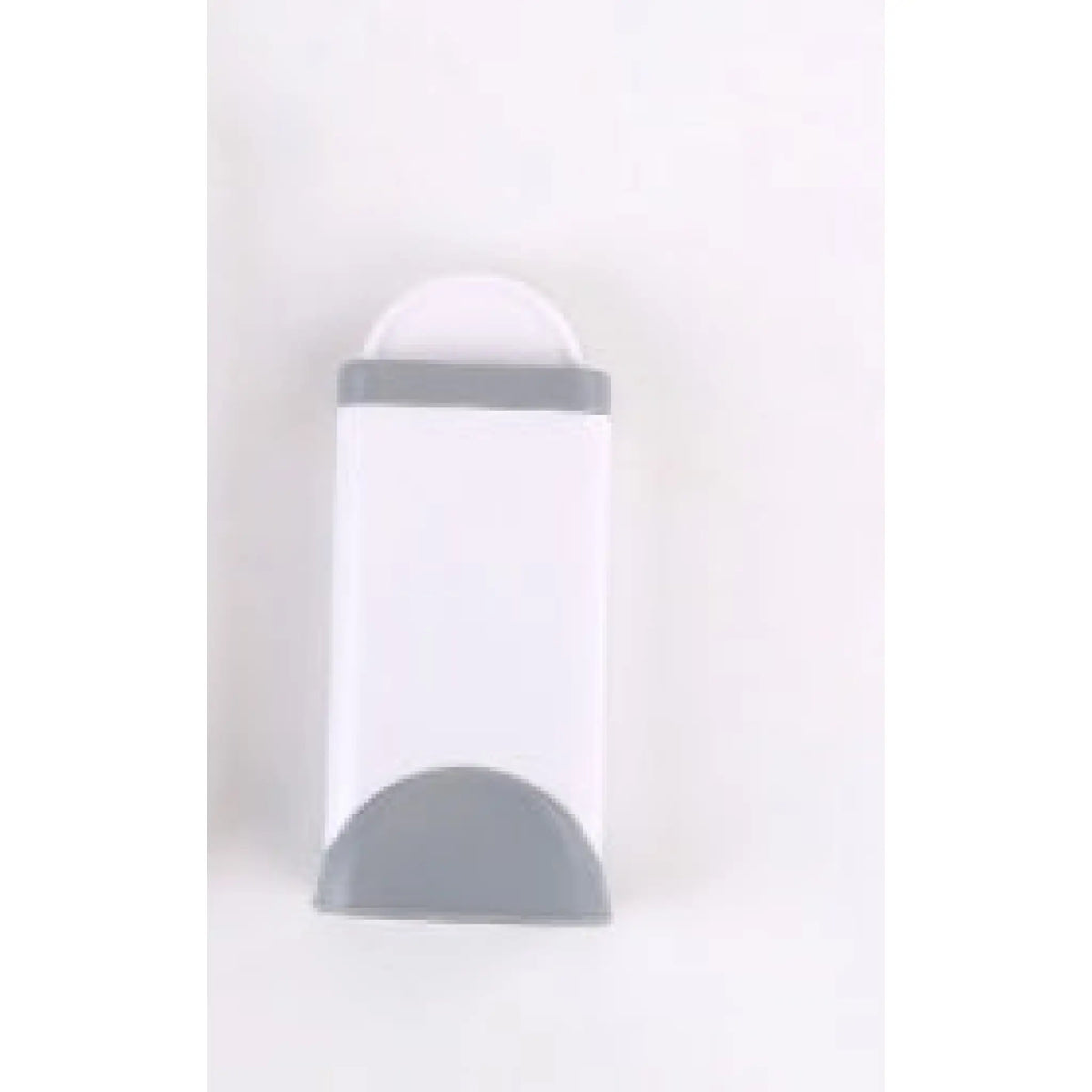 Gray and white self-cleaning base for pet hair remover brush, front view