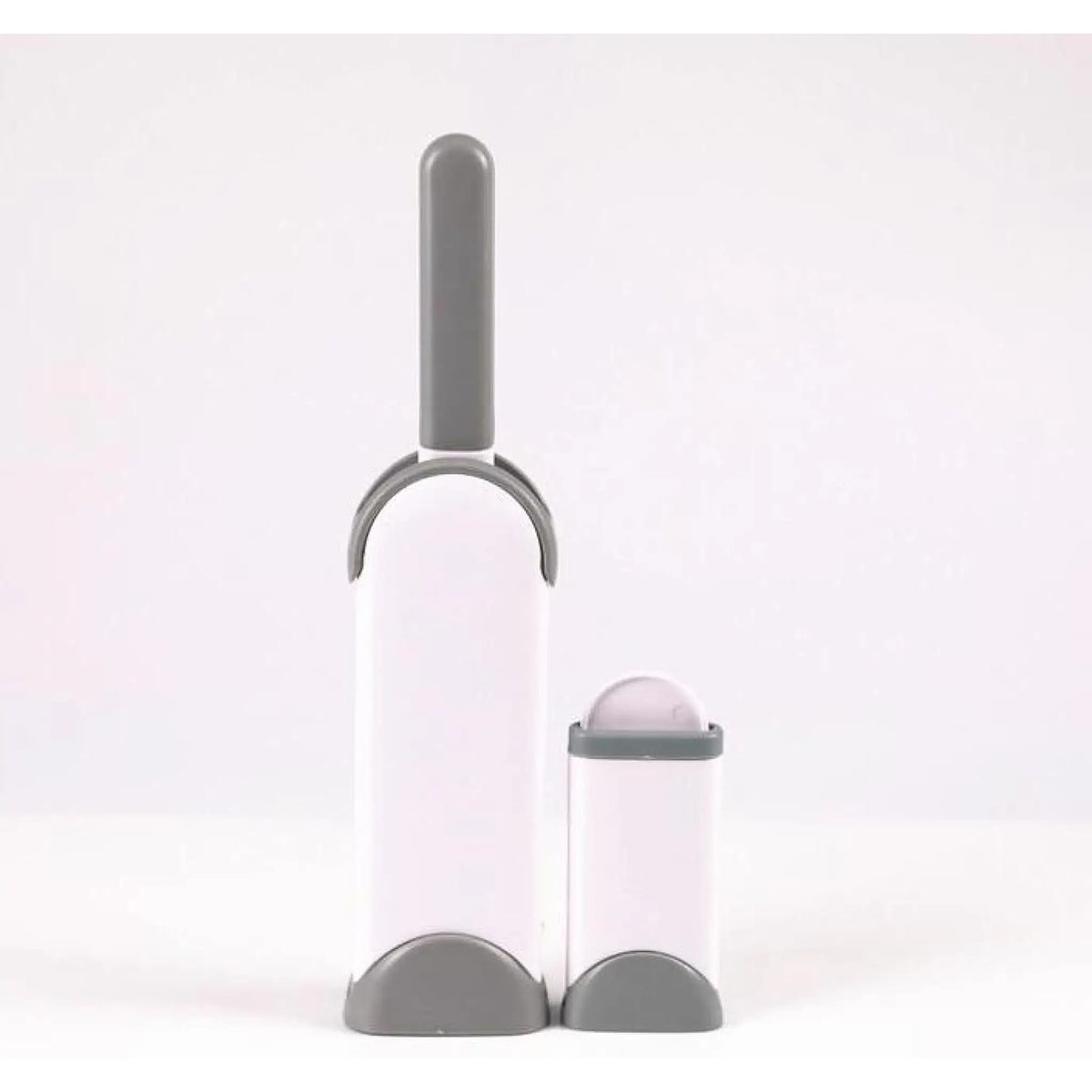 Pet hair remover brush removing cat and dog fur from furniture and fabric