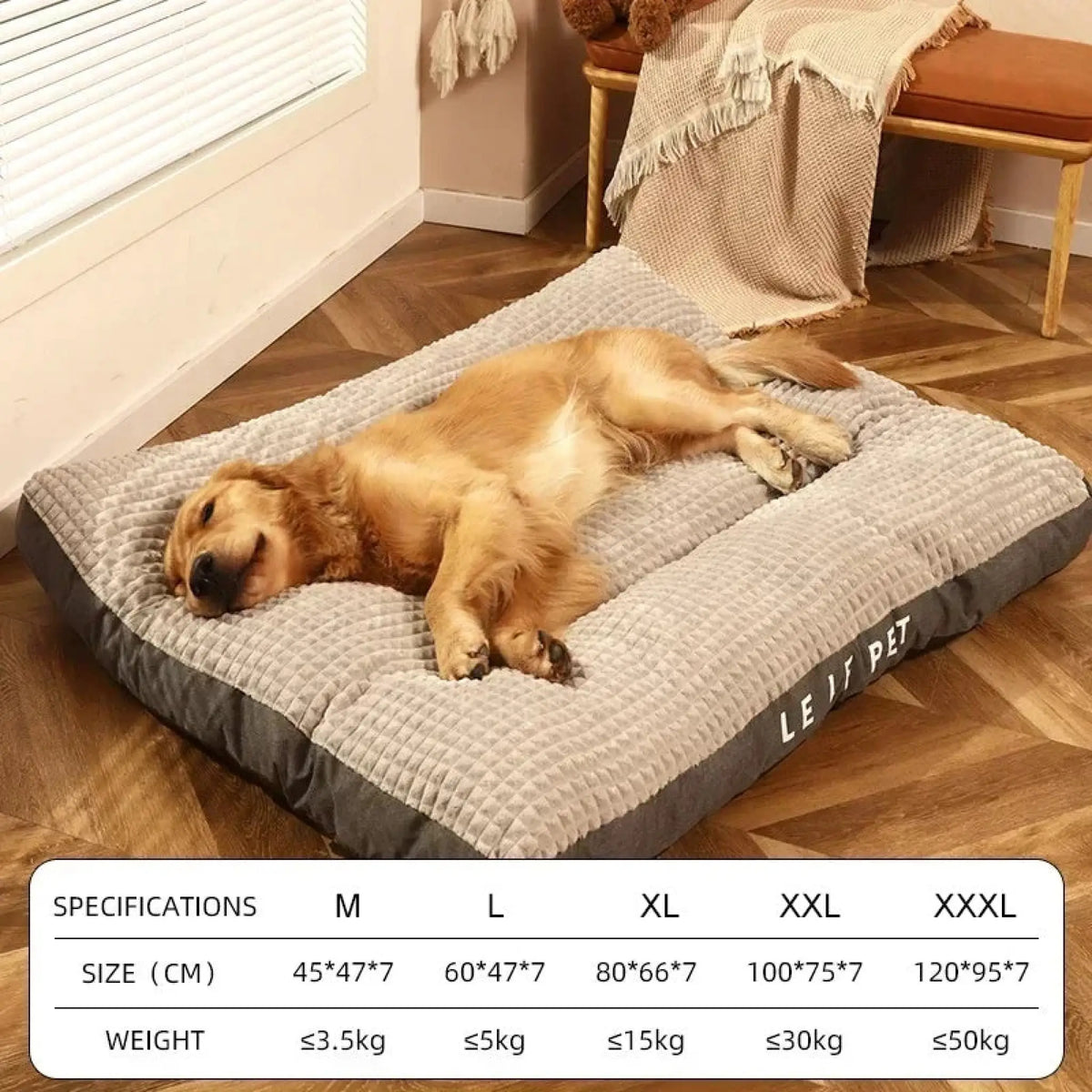 Plush fleece dog bed in gray and charcoal with size chart showing M to XXXL dimensions and weight limits