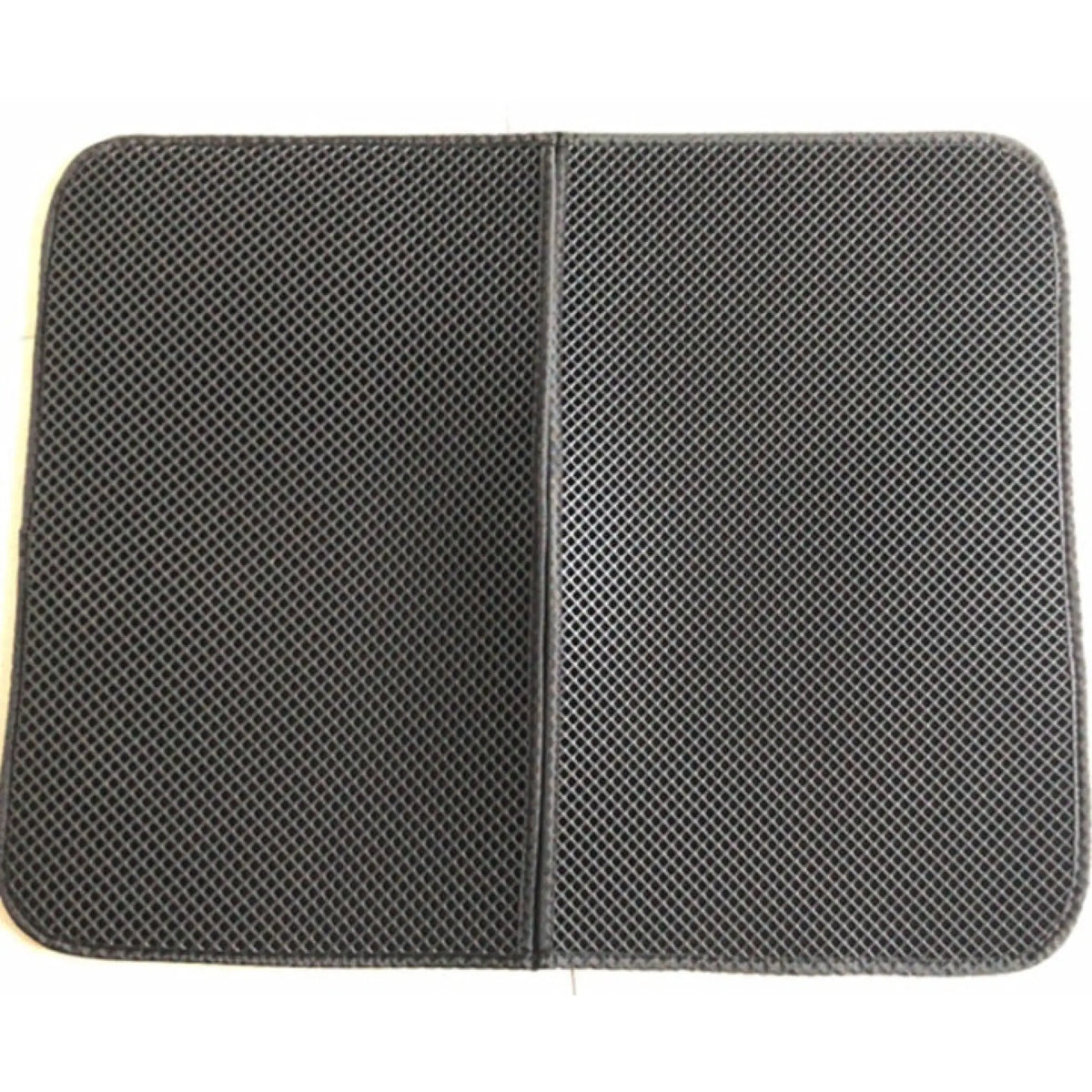 Close-up top view of a gray diamond-textured EVA cat litter mat with center fold seam