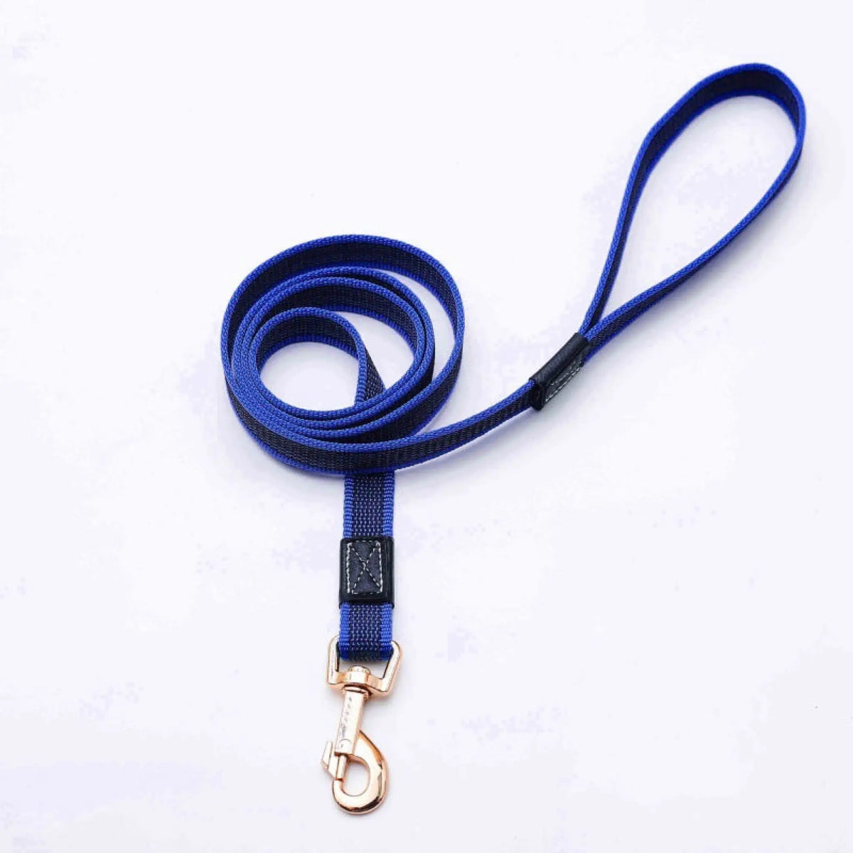 Royal blue non-slip dog walking leash with looped handle and rose gold clip