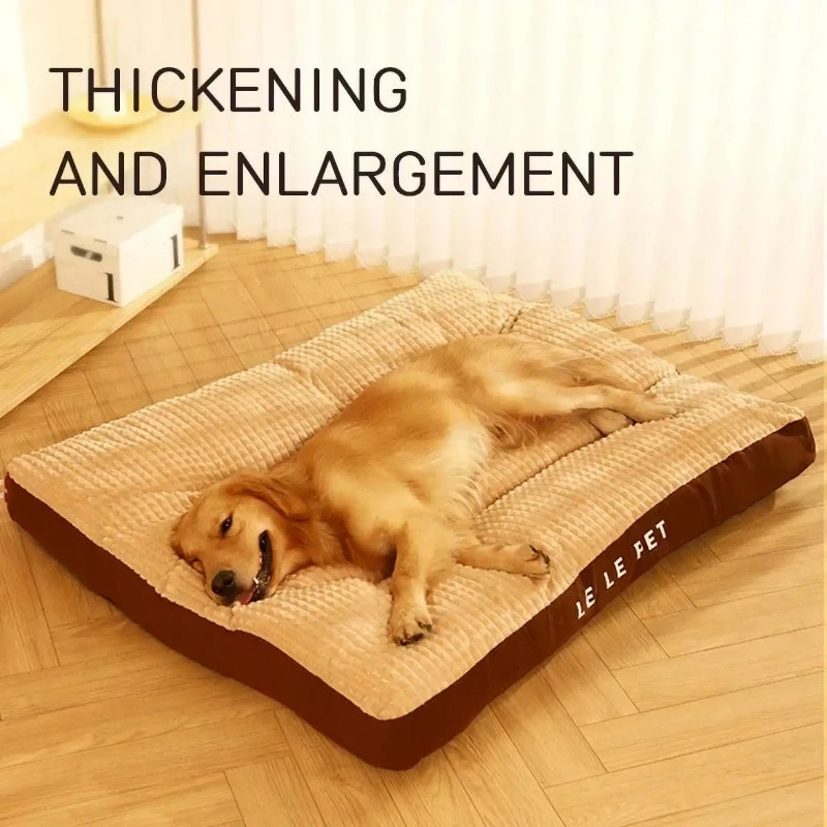 Golden retriever lying on a thick brown-trimmed fleece dog bed on a wooden floor